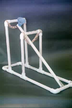 Build a catapult that is less than one meter in height and less than one 